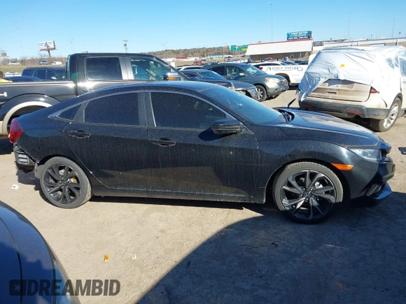 2019 Honda Civic Sport with VIN 19XFC2F80KE033598, listed as a IAAI auction lot 41732698 with 101,664 mi miles and . Bid and sale history available at DreamBid. Image 13.