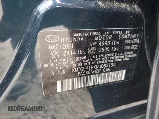 2022 Genesis G70 3.3T with VIN KMTG54TEXNU083193, listed as a Copart auction lot 56627395 with 16,980 mi miles and Salvage title. Bid and sale history available at DreamBid. Image 12.