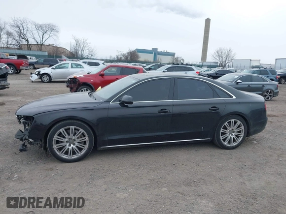 2012 Audi A8 с VIN WAUAVAFD0CN035731, выставлен на аукционе IAAI как лот 41286022 с пробегом 82 835 миль миль и . История ставок и продаж доступна на DreamBid. Изображение 15.