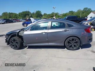 2019 Honda Civic Sport with VIN 19XFC2F89KE019683, listed as a IAAI auction lot 42055871 with 107,941 mi miles and . Bid and sale history available at DreamBid. Image 15.