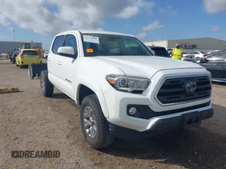 2018 Toyota Tacoma SR5 with VIN 5TFAZ5CN0JX063364, listed as a IAAI auction lot 41752426 with 95,019 mi miles and . Bid and sale history available at DreamBid. Image 1.