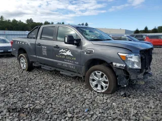 2024 Nissan Titan XD PRO-4X with VIN 1N6AA1FB9RN103589, listed as a Copart auction lot 74289014 with 19,332 mi miles and Salvage Title. Bid and sale history available at carsss.com. Image 4.