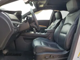 2019 Cadillac XT4 FWD Premium Luxury z VIN 1GYFZCR41KF127888, wystawiony jako Copart lot #55027135 z przebiegiem 111 057 mil mil oraz Szkody całkowita. Historia ofert i sprzedaży dostępna na DreamBid. Obrazek 7.