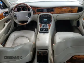 1999 Jaguar XJ z VIN SAJKX6048XC849376, wystawiony jako Copart lot #70538064 z przebiegiem 122 891 mil mil oraz Szkoda całkowita • Salvage title. Historia ofert i sprzedaży dostępna na DreamBid. Obrazek 8.