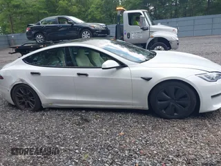 2021 Tesla Model S Plaid z VIN 5YJSA1E62MF452838, wystawiony jako IAAI lot #42726183 z przebiegiem 21 725 mil mil oraz . Historia ofert i sprzedaży dostępna na DreamBid. Obrazek 13.