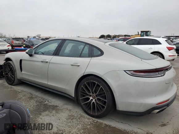 2021 Porsche Panamera с VIN WP0AJ2A75ML120017, выставлен на аукционе Copart как лот 81517913 с пробегом 26 083 миль миль и . История ставок и продаж доступна на DreamBid. Изображение 2.