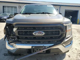 2021 Ford F-150 XL с VIN 1FTEW1EP1MFB45521, выставлен на аукционе Copart как лот 56739035 с пробегом 73 449 миль миль и Списание • Salvage title. История ставок и продаж доступна на DreamBid. Изображение 5.