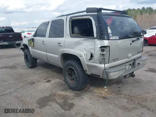 2005 Chevrolet Tahoe Z71 with VIN 1GNEK13T05R246648, listed as a IAAI auction lot 41483045 with 312,536 mi miles. Bid and sale history available at carsss.com. Image 3.