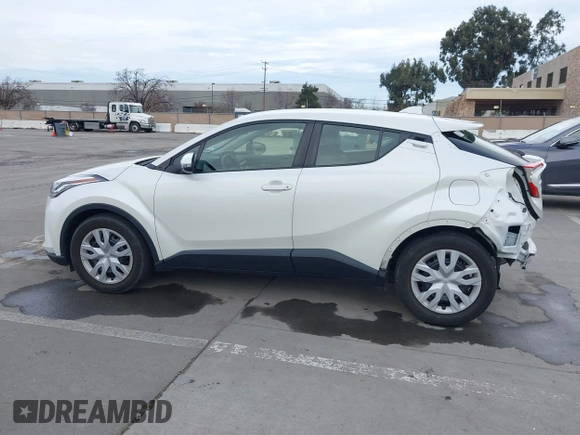 2021 Toyota C-HR LE with VIN JTNKHMBX1M1098521, listed as a IAAI auction lot 41539775 with 14,840 mi miles. Bid and sale history available at carsss.com. Image 15.