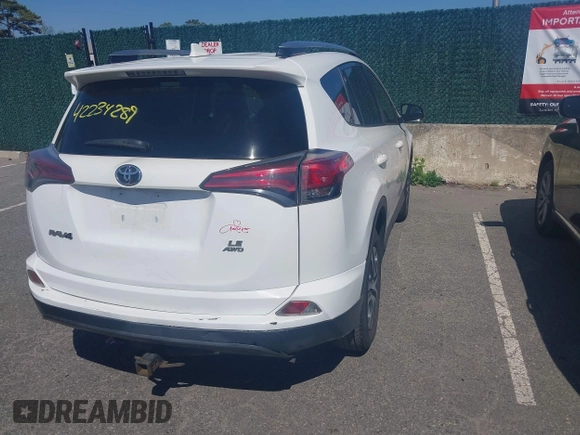 2017 Toyota RAV4 LE with VIN JTMBFREV4HJ112595, listed as a IAAI auction lot 42234289 with 207,379 mi miles and . Bid and sale history available at carsss.com. Image 4.