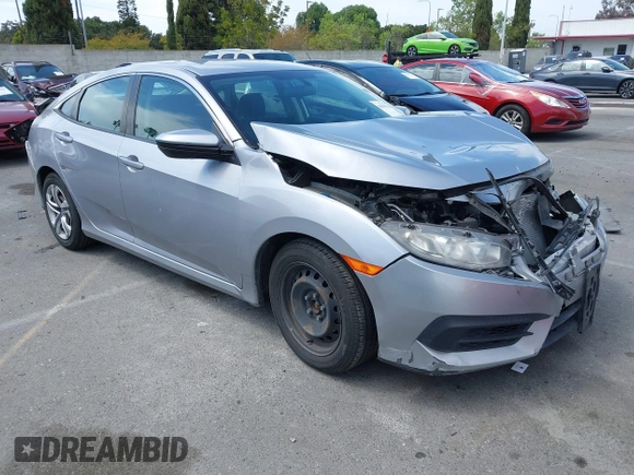 2017 Honda Civic LX with VIN 2HGFC2F5XHH562089, listed as a IAAI auction lot 42010207 with 99,809 mi miles and . Bid and sale history available at DreamBid. Image 1.