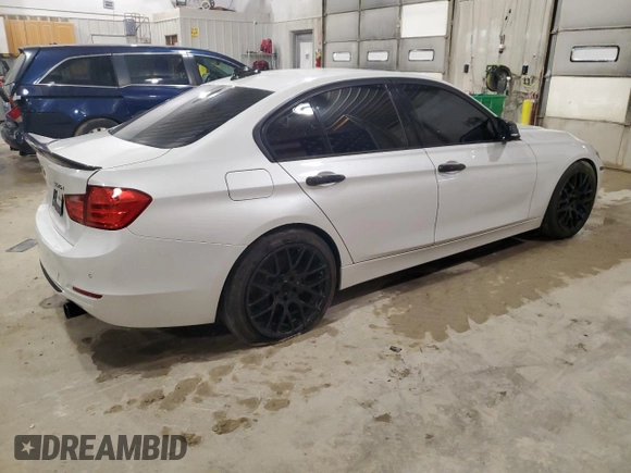 2013 BMW 3 Series 335i with VIN WBA3A9G51DNP36712, listed as a Copart auction lot 52407465 with 117,972 mi miles and Salvage title. Bid and sale history available at DreamBid. Image 3.