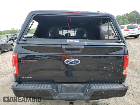 2017 Ford F-150 XL с VIN 1FTEX1CF8HFA34414, выставлен на аукционе Copart как лот 54101235 с пробегом 93 174 миль миль и Списание • Salvage title. История ставок и продаж доступна на DreamBid. Изображение 6.