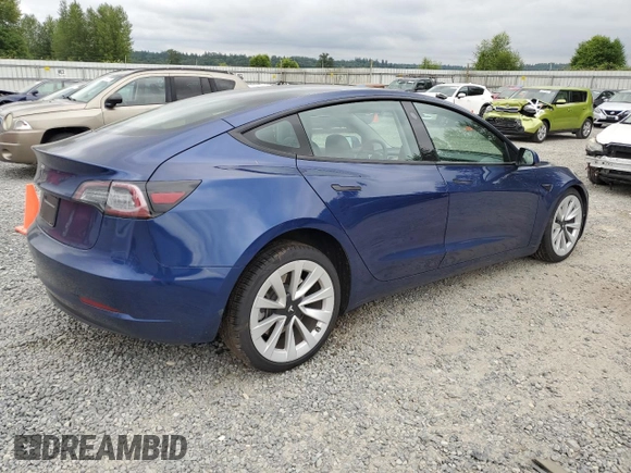 2023 Tesla Model 3 with VIN 5YJ3E1EA7PF450973, listed as a Copart auction lot 61082175 with 47,029 mi miles and Salvage title. Bid and sale history available at DreamBid. Image 3.