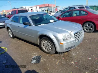2005 Chrysler 300 with VIN 2C3JA43RX5H569173, listed as a IAAI auction lot 41618421 with 126,019 mi miles. Bid and sale history available at carsss.com. Image 1.