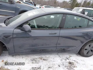 2023 Tesla Model 3 Long Range with VIN 5YJ3E1EBXPF708122, listed as a IAAI auction lot 41185314 with 27,765 mi miles and . Bid and sale history available at DreamBid. Image 14.