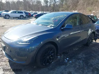 2023 Tesla Model Y Long Range with VIN 7SAYGAEE9PF905943, listed as a IAAI auction lot 41444255 with 11,179 mi miles. Bid and sale history available at carsss.com. Image 2.