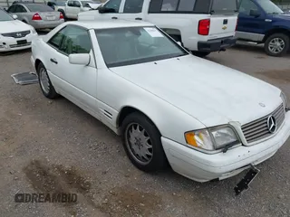 1997 Mercedes-Benz SL 500 z VIN WDBFA63F0VF146394, wystawiony jako IAAI lot #42308697 z przebiegiem 106 935 mil mil oraz . Historia ofert i sprzedaży dostępna na DreamBid. Obrazek 1.