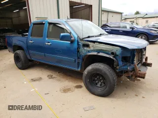 2011 GMC Canyon SLE1 with VIN 1GTH6MFE3B8119385, listed as a Copart auction lot 70492994 with 105,305 mi miles and Salvage Title. Bid and sale history available at carsss.com. Image 4.