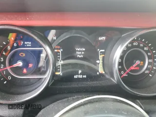 2022 Jeep Gladiator Rubicon с VIN 1C6JJTBGXNL130958, выставлен на аукционе Copart как лот 52515165 с пробегом 62 152 миль миль и Списание • Salvage title. История ставок и продаж доступна на DreamBid. Изображение 9.