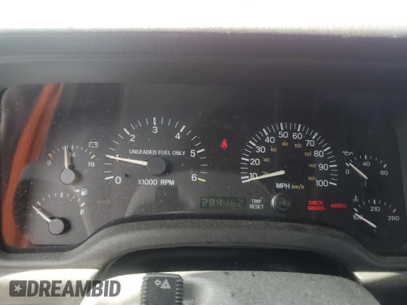1998 Jeep Cherokee Sport with VIN 1J4FJ68S2WL285432, listed as a Copart auction lot 57183145 with 284,162 mi miles and Clean title. Bid and sale history available at DreamBid. Image 9.