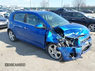 2016 Chevrolet Sonic LTZ z VIN 1G1JE6SB5G4150771, wystawiony jako IAAI lot #41662866 z przebiegiem 101 476 mil mil oraz . Historia ofert i sprzedaży dostępna na DreamBid. Obrazek 1.