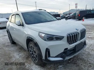 2025 BMW X1 xDrive28i with VIN WBX73EF09S5121466, listed as a IAAI auction lot 41455838 with 408 mi miles. Bid and sale history available at carsss.com. Image 1.