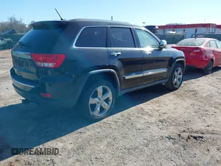 2011 Jeep Grand Cherokee Overland with VIN 1J4RS6GGXBC659349, listed as a IAAI auction lot 41778399 with 219,624 mi miles and . Bid and sale history available at DreamBid. Image 4.