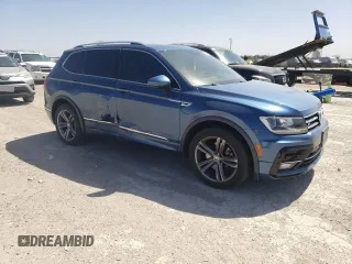 2019 Volkswagen Tiguan SE with VIN 3VV3B7AX4KM061848, listed as a Copart auction lot 49978745 with 100,295 mi miles and Salvage Title. Bid and sale history available at DreamBid. Image 4.
