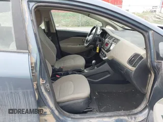 2016 Kia Rio LX with VIN KNADM4A39G6641920, listed as a IAAI auction lot 42158020 with 136,055 mi miles and . Bid and sale history available at DreamBid. Image 5.
