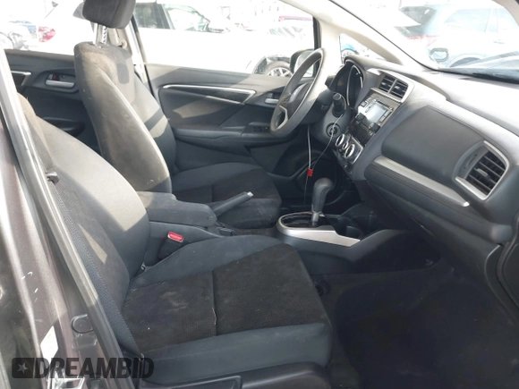 2015 Honda Fit LX with VIN 3HGGK5H58FM713533, listed as a IAAI auction lot 40473868 with Not provided miles and . Bid and sale history available at DreamBid. Image 5.