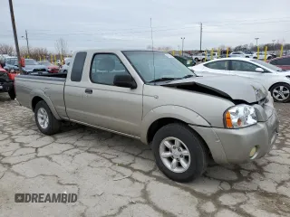 2003 Nissan Frontier XE with VIN 1N6DD26T03C423079, listed as a Copart auction lot 44593295 with 232,850 mi miles and Salvage title. Bid and sale history available at DreamBid. Image 4.
