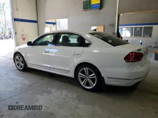 2015 Volkswagen Passat SE with VIN 1VWBS7A36FC005034, listed as a Copart auction lot 47081545 with 147,810 mi miles and Salvage title. Bid and sale history available at DreamBid. Image 2.
