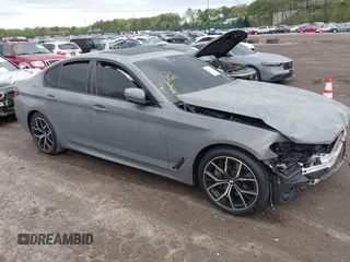 2021 BMW 5 Series 540i xDrive with VIN WBA73BJ0XMWX06571, listed as a IAAI auction lot 42169757 with 62,013 mi miles and . Bid and sale history available at DreamBid. Image 1.