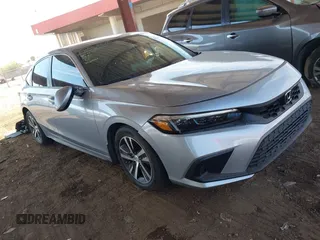 2022 Honda Civic LX z VIN 19XFL2H51NE001363, wystawiony jako IAAI lot #41634136 z przebiegiem 12 792 mil mil oraz . Historia ofert i sprzedaży dostępna na DreamBid. Obrazek 1.