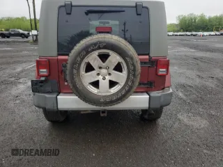 2008 Jeep Wrangler Sahara z VIN 1J4FA54198L505014, wystawiony jako Copart lot #55328045 z przebiegiem 128 049 mil mil oraz Szkoda całkowita • Salvage title. Historia ofert i sprzedaży dostępna na DreamBid. Obrazek 6.