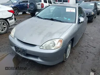 2001 Honda Insight z VIN JHMZE14711T003249, wystawiony jako IAAI lot #41526548 z przebiegiem 123 871 mil mil oraz . Historia ofert i sprzedaży dostępna na DreamBid. Obrazek 2.