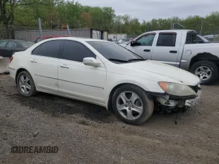 2005 Acura RL with VIN JH4KB16585C014180, listed as a Copart auction lot 53660715 with 0 mi miles and Salvage Title. Bid and sale history available at carsss.com. Image 4.