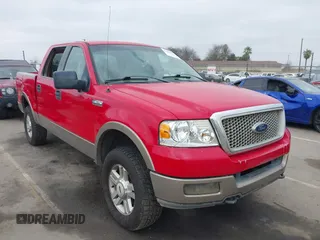 2004 Ford F-150 XLT with VIN 1FTPW14564KC89792, listed as a IAAI auction lot 41658885 with 219,012 mi miles. Bid and sale history available at carsss.com. Image 1.