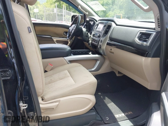 2017 Nissan Titan SV with VIN 1N6AA1E58HN542504, listed as a IAAI auction lot 42564921 with 161,555 mi miles and . Bid and sale history available at DreamBid. Image 5.