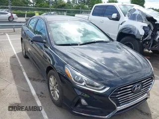 2019 Hyundai Sonata SE z VIN 5NPE24AF7KH740516, wystawiony jako IAAI lot #42235621 z przebiegiem 88 651 mil mil oraz . Historia ofert i sprzedaży dostępna na DreamBid. Obrazek 1.