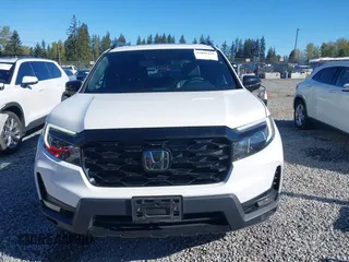 2023 Honda Passport Elite with VIN 5FNYF8H01PB004087, listed as a IAAI auction lot 42045433 with 20,677 mi miles and . Bid and sale history available at carsss.com. Image 12.