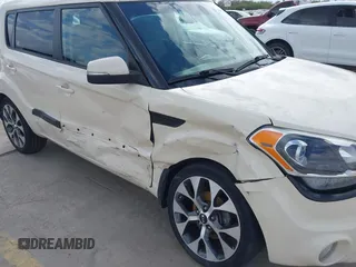 2012 Kia Soul + with VIN KNDJT2A63C7462882, listed as a IAAI auction lot 41162839 with 102,904 mi miles. Bid and sale history available at carsss.com. Image 6.