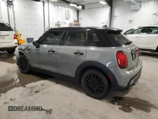 2023 MINI Hardtop 4 Door Cooper Classic z VIN WMW33DK0XP2S54786, wystawiony jako Copart lot #87873415 z przebiegiem 50 956 mil mil oraz Szkoda całkowita • Salvage title. Historia ofert i sprzedaży dostępna na DreamBid. Obrazek 2.