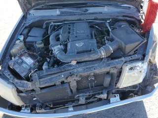 2006 Nissan Frontier SE z VIN 1N6AD07U56C461216, wystawiony jako Copart lot #87716875 z przebiegiem 224 977 mil mil oraz Szkoda całkowita • Salvage title. Historia ofert i sprzedaży dostępna na DreamBid. Obrazek 11.