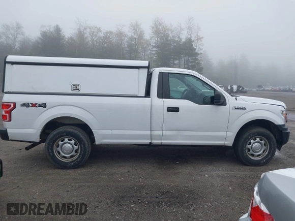 2018 Ford F-150 XL with VIN 1FTMF1EB1JKE19030, listed as a IAAI auction lot 42233745 with 193,352 mi miles and . Bid and sale history available at DreamBid. Image 13.