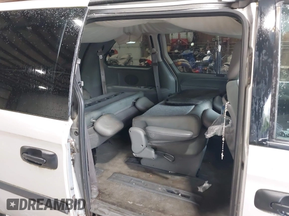 2005 Dodge Caravan SE with VIN 1D4GP25R05B394885, listed as a IAAI auction lot 42144363 with 237,831 mi miles and . Bid and sale history available at carsss.com. Image 8.