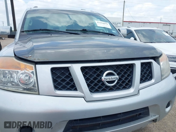 2014 Nissan Armada SV z VIN 5N1BA0ND7EN600201, wystawiony jako IAAI lot #42154850 z przebiegiem 290 225 mil mil oraz . Historia ofert i sprzedaży dostępna na DreamBid. Obrazek 6.