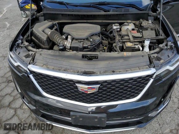 2023 Cadillac XT6 FWD Premium Luxury with VIN 1GYKPCRS5PZ220616, listed as a Copart auction lot 56913725 with 25,860 mi miles and Salvage title. Bid and sale history available at DreamBid. Image 12.
