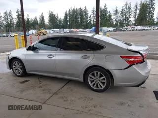 2014 Toyota Avalon Limited with VIN 4T1BK1EB3EU104576, listed as a IAAI auction lot 41773431 with 105,419 mi miles. Bid and sale history available at carsss.com. Image 14.